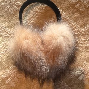Fox fur earmuffs with very dark brown velvet head band.